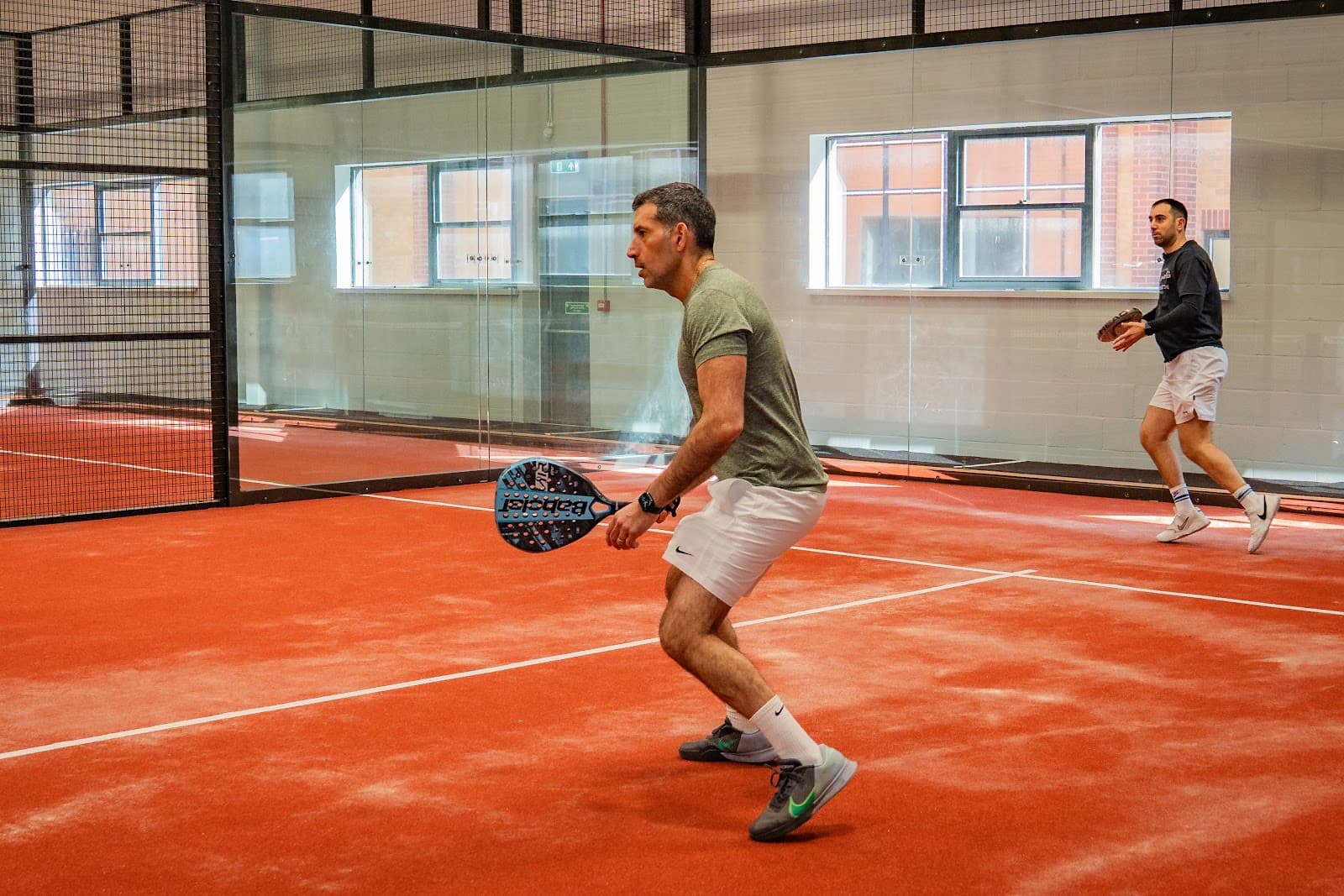 Padel players enjoying a match